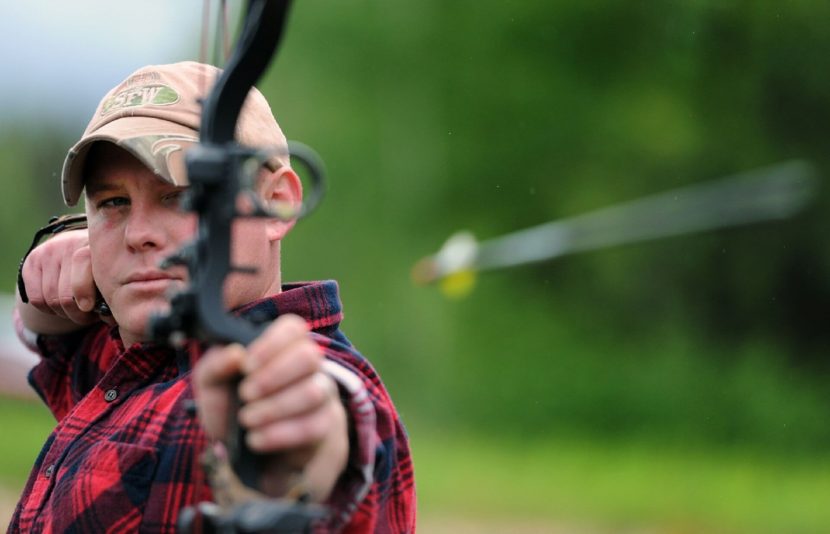 An archer aiming an arrow.