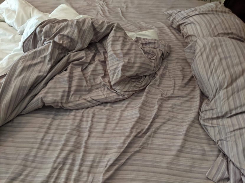 picture of an unmade bed