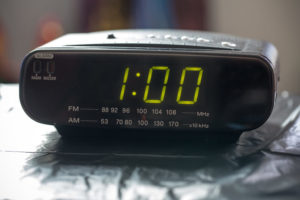 Digital clock reads 1 a.m.