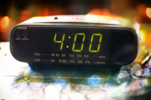 Digital clock reading 4 a.m.